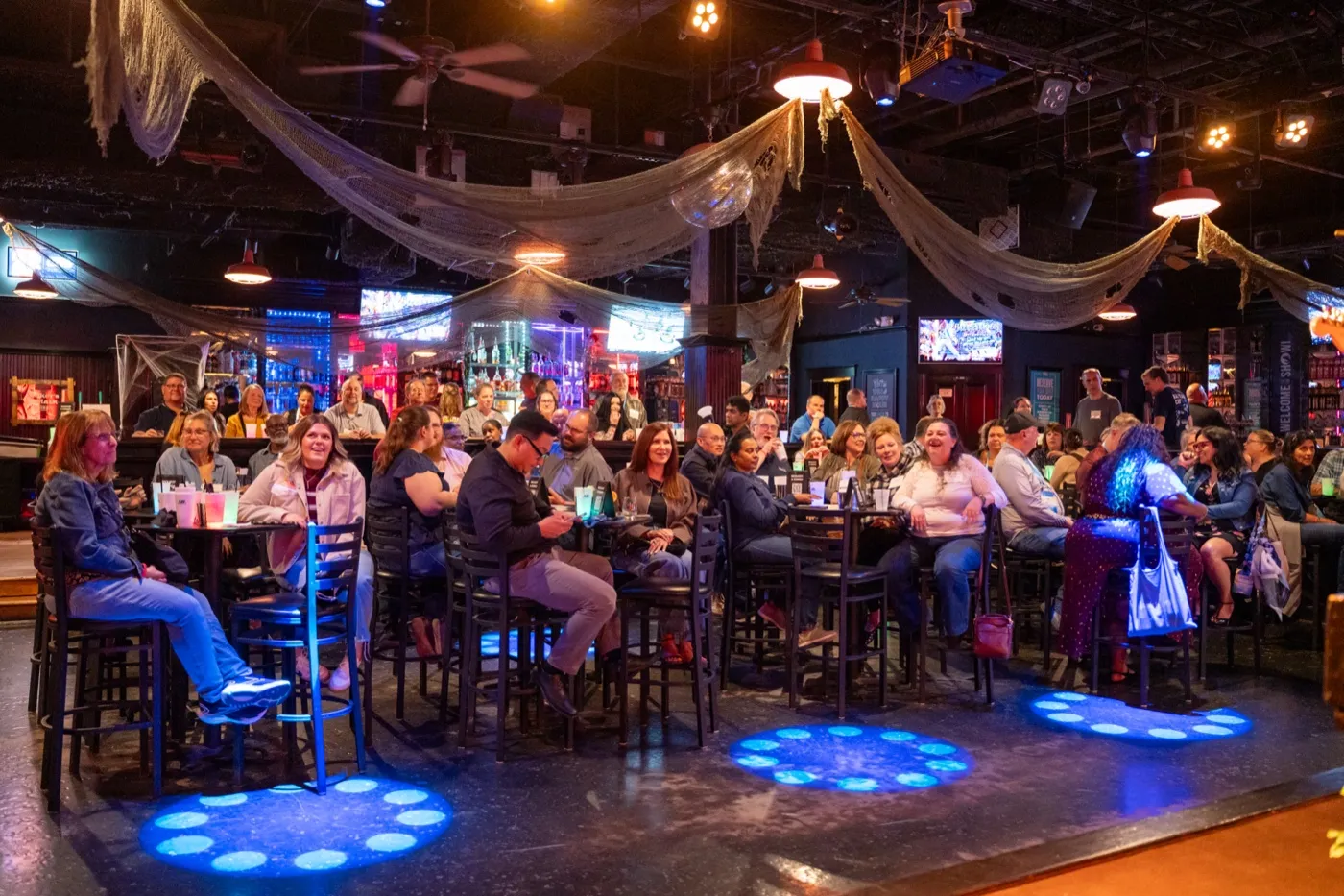 Kansas City corporate event photography - wide view of a packed room at a client appreciation night