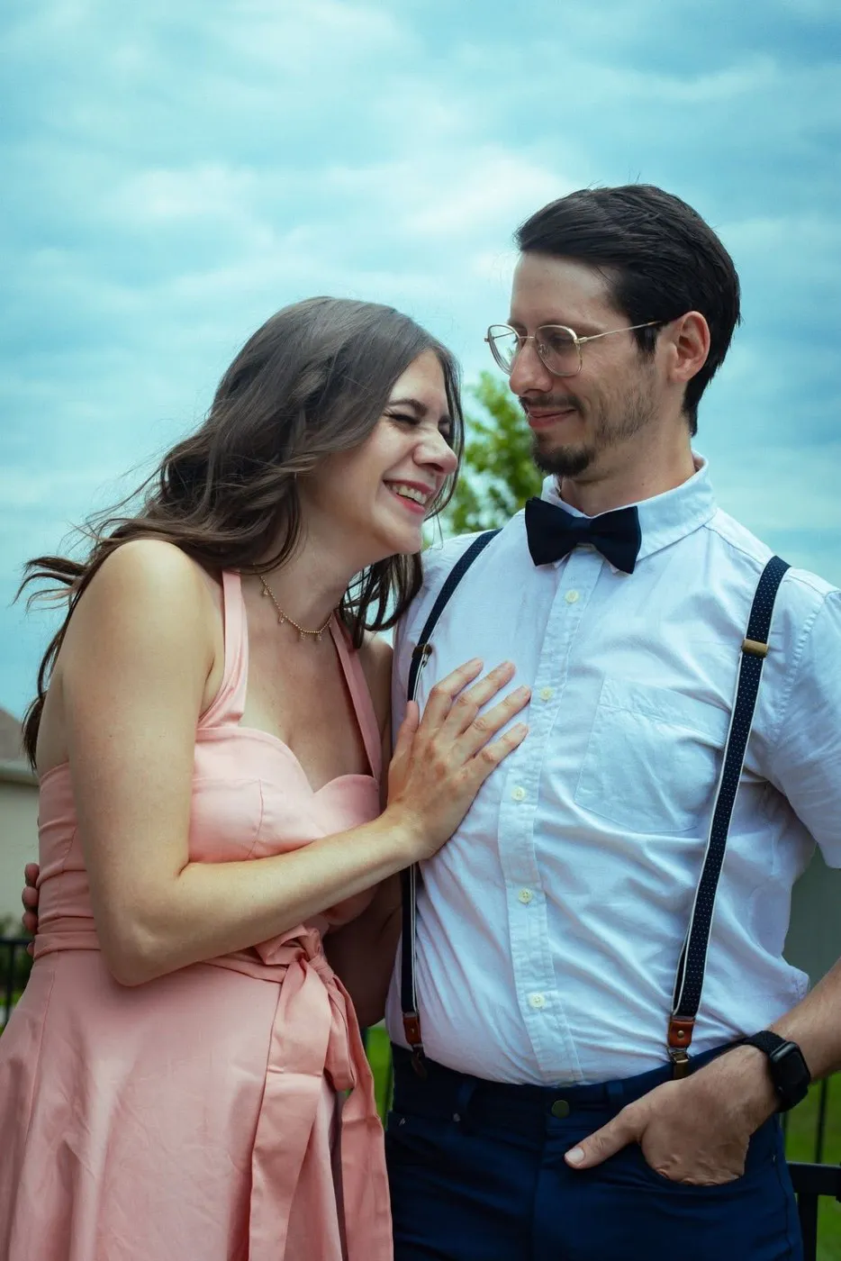 Kansas City couples photographer - couple laughing together, bow tie and pink dress