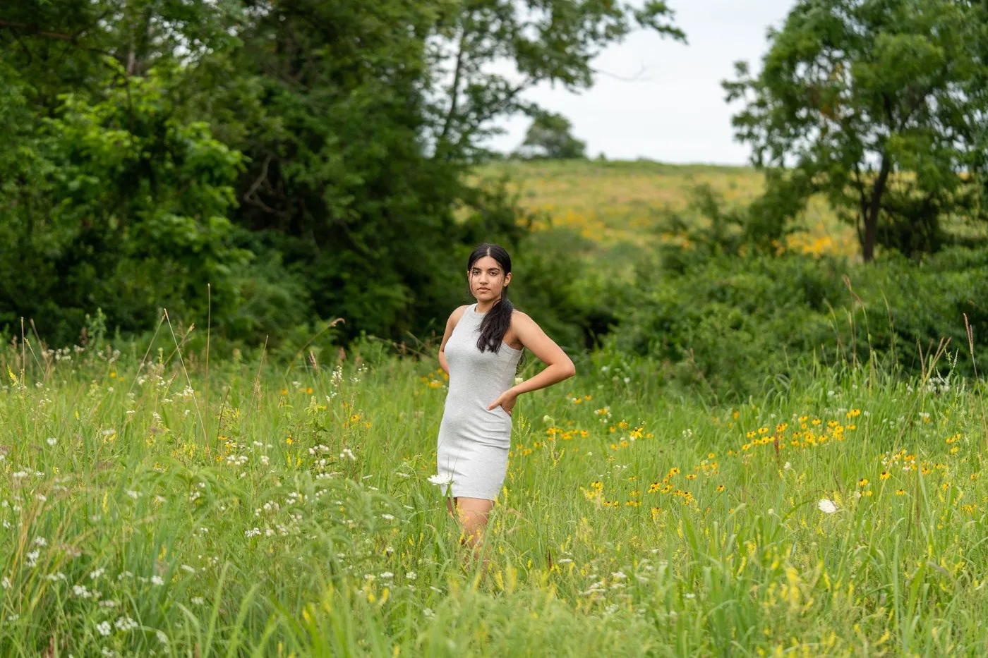 Kansas City portrait photographer - portrait in tall prairie grass and wildflowers